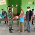 Koptu Gede Ardane Melaksanakan Pengamanan Pembagian BLT