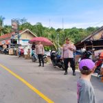 Polsek pesisir utara hadir di pasar melsom berikan rasa aman